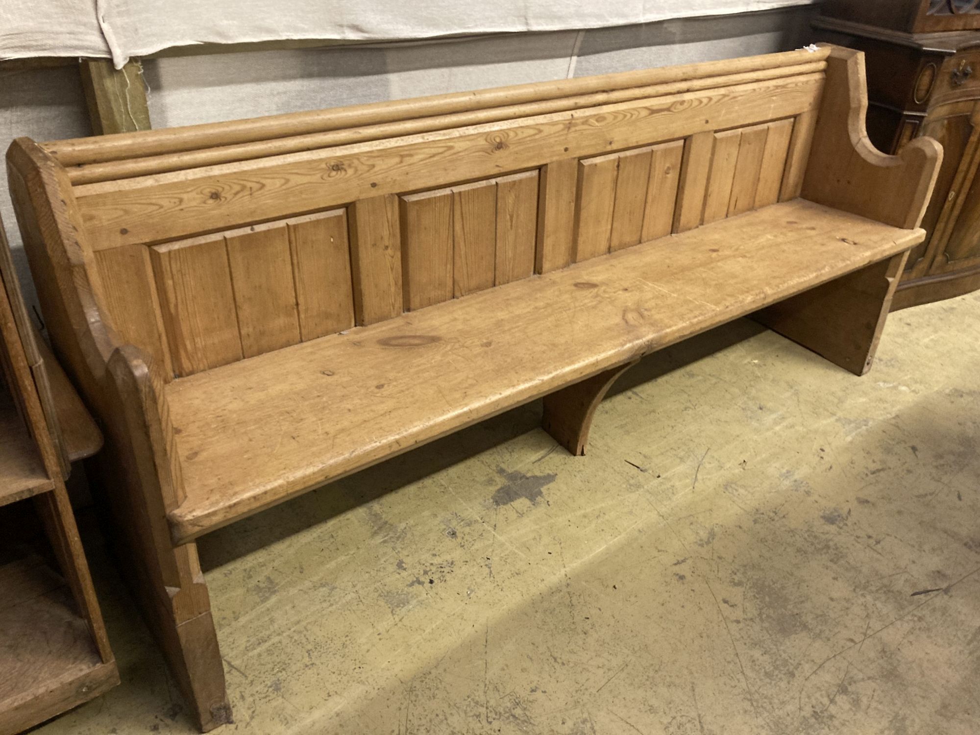 A Victorian stripped pine pew, length 194cm, depth 50cm, height 81cm